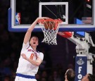 Kristaps Porzingis #6 of the New York Knicks slams home a dunk against the Sacramento Kings during the first half at Madison Square Garden on December 4, 2016 in New York City.