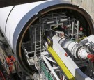 A worker inspects the Tunnel Boring Machine at the Pudding Mill Lane Crossrail construction site in east London on May 16, 2013 in London, England.