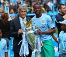 Man City's Manuel Pellegrini and Yaya Toure