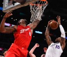 DeAndre Jordan #6 of the Los Angeles Clippers and Thomas Robinson #15 of the Los Angeles Lakers battle for a rebound in the first half of the game at Staples Center on December 25, 2016 in Los Angeles, California. 