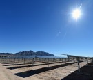 Rows of solar panels operate during a dedication ceremony to commemorate the completion of the 102-acre, 15-megawatt Solar Array II Generating Station at Nellis Air Force Base on February 16, 2016.