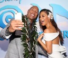 Actors Dwayne Johnson (L) and Nicole Scherzinger attend The World Premiere of Disneys 'MOANA' at the El Capitan Theatre on Monday, November 14, 2016 in Hollywood, CA.