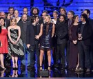 (L-R) Actress Kaley Cuoco (C) with actors and producers from 'The Big Bang Theory' including Melissa Rauch, Johnny Galecki, Simon Helberg, Jim Parsons, Mayim Bialik, and Kunal Nayyar, 