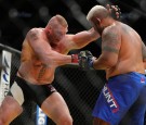 Brock Lesnar looks to take down Mark Hunt during the UFC 200 event at T-Mobile Arena on July 9, 2016 in Las Vegas, Nevada. 