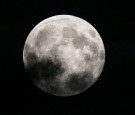 The moon rises above Glastonbury Tor on August 10, 2014 in Somerset, England.