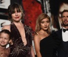  (L-R) Lee Raviv, Milla Jovovich, Rolaand William Levy attend the world premiere of 'Resident Evil: The Final Chapter' at the Roppongi Hills on December 13, 2016 in Tokyo, Japan.