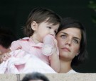 Katie Holmes and daughter Suri watch the LA Galaxy vs. Chelsea FC soccer game July 22, 2007 at the Home Depot Center in Carson, California.