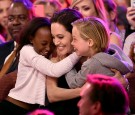 Actress Angelina Jolie hugs Zahara Marley Jolie-Pitt (L) and Shiloh Nouvel Jolie-Pitt (R) after winning award for Favorite Villain in 'Maleficent' during Nickelodeon's 28th Annual Kids' Choice Awards 