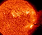 IN SPACE - JUNE 7: In this handout from NASA/Solar Dynamics Observatory, a solar large flare erupts off the sun June 7, 2011 in space. A large cloud of particles flew up and then was pulled back down to the sun's surface. According to NASA, the event is n