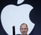 Apple CEO and co-founder Steve Jobs holds up the new Mac Book Air after he delivered the keynote speech to kick off the 2008 Macworld at the Moscone Center January 15, 2008 in San Francisco, California. 