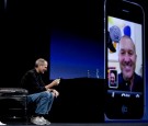 Steve Jobs, chief executive officer of Apple Inc., demonstrates the FaceTime video call functionality of the iPhone 4 during his keynote address at the Apple Worldwide Developers Conference (WWDC).