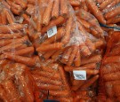 Carrots sit in a BOX as around 200 members of the Jesus House Church and community members help package Christmas hampers as part of The Trussell Trust Foodbank Project on December 19, 2014 in London,