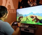 Gamers try out the new to play the new video game 'The Legend of Zelda: Breath of the Wild' in the Nintendo booth during the annual E3 2016 gaming conference at the Los Angeles Convention Center.