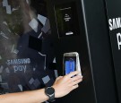 Consumers Use The Mobile Payment Service Samsung Pay At The Samsung Pay Vending Machine In Austin