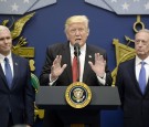 ARLINGTON, VA - JANUARY 27: U.S. President Donald Trump speaks as Defense Secretary Gen. James Mattis and Vice President Mike Pence look on in the Hall of Heroes at the Department of Defense