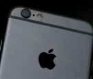  The Apple logo is displayed on an iPhone 6 on July 21, 2015 in San Francisco, California. 
