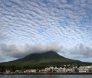 CHARLESTOWN, ST KITTS AND NEVIS - NOVEMBER 23: Cloud formations over the volcanic peak on Nevis on the fourth day of an official visit on November 23, 2016 in Port Zante, St Kitts and Nevis. Prince Harry's visit to The Caribbean marks the 35th Anniversary