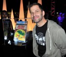 Director Zack Snyder poses in front of Action Comics issue #1 at DC Entertainment and Warner Bros. host Superman 75 party at San Diego Comic-Con at Hard Rock Hotel San Diego on July 19, 2013.