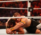 Seth Rollins and John Cena battle it out at the WWE SummerSlam 2015 at Barclays Center of Brooklyn on August 23, 2015 in New York City. 