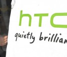 A woman walks past a HTC store in Taipei on February 4, 2013. Taiwan's top smartphone maker HTC said on February 4 its net profit in the three months to December plunged 91 percent from a year ago