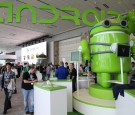 Attendees visit the Android booth during the Google I/O developers conference at the Moscone Center on May 15, 2013 in San Francisco, California.