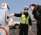 E-Patrol Robot Sheriff Regulates Pedestrians' Actions In Xiangyang