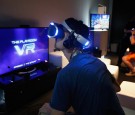 Game enthusiasts test out the PS4 virtual reality 'Project Morpheus' during the Annual Gaming Industry Conference E3 at the Los Angeles Convention Center on June 16, 2015 in Los Angeles, California.