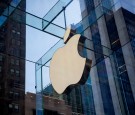 The Apple logo is displayed at the Apple Store June 17, 2015 on Fifth Avenue in New York City.