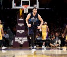 Andrew Bogut #6 of the Dallas Mavericks reacts to scoring during the second half of a game against the Los Angeles Lakers at Staples Center on November 8, 2016 in Los Angeles, California.