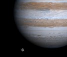 The solar system's largest moon, Ganymede, is captured here alongside the planet Jupiter in this picture taken by NASA's Cassini spacecraft, December 3, 2000. 