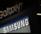 A Samsung and a Galaxy signs are seen at the Samsung booth during CES 2017 at the Las Vegas Convention Center on January 5, 2017 in Las Vegas, Nevada. 