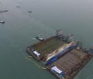 Submersible vessel attempts to salvage sunken Sewol ferry in waters off Jindo, on March 24, 2017 in Jindo-gun, South Korea. 