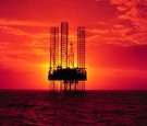 Pennzenergy Company Oil Exploration Drilling Rig In The Gulf Of Mexico During Sunset (Ph