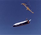 The X-40A Is Released From Its Harness Suspended From A Helicopter 15,000 Feet Above Nasa Dryden Flight Research Center At Edwards Air Force Base, In California, March 14, 2001.