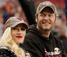 Musicians Gwen Stefani and Blake Shelton attend the NFL game between the Green Bay Packers and Arizona Cardinals at the University of Phoenix Stadium on December 27, 2015 in Glendale, Arizona.