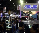 Asus laptops on display at the Commart Next-Gen 2014 in...