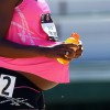 A pregnant Alysia Montano is pictured after running in the opening round of the Women's 800 Meter on June 26, 2014
