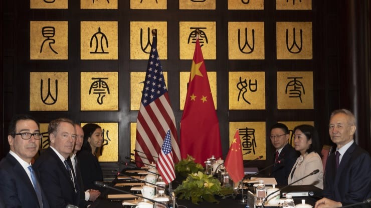 Representatives of U.S. and Chinese government discussing the Phase One of trade agreement.