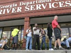 U.S. citizens are waiting on line outside the Georgia Department of Driver Services