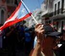 Hundreds of Puerto Ricans protest and demand the resignation of Gov. Wanda Vasquez.