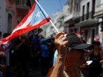 Hundreds of Puerto Ricans protest and demand the resignation of Gov. Wanda Vasquez.