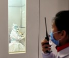 Coronavirus Patients in Wuhan Try to Spread Disease by Spitting at Doctors