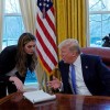 Hope Hicks speaking with President Donald Trump