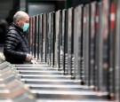 Man in a face mask is seen at the Cadorna railway station in Milan