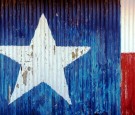 Texas flag on a barn side