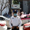 A police officer wears a protective face mask on the street after the governor of the northern Mexican state of Coahuila said on Saturday that a new case of coronavirus had been confirmed, in Mexico City