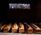 Coffins of people who have died from coronavirus in the church of the Serravalle Scrivia cemetery