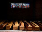 Coffins of people who have died from coronavirus in the church of the Serravalle Scrivia cemetery