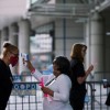 Medical personnel take temperatures as they prepare the Ernest N. Morial Convention Center for coronavirus patients in New Orleans, Louisiana