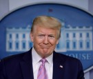 President Donald Trump reacts during the coronavirus response daily briefing in Washington